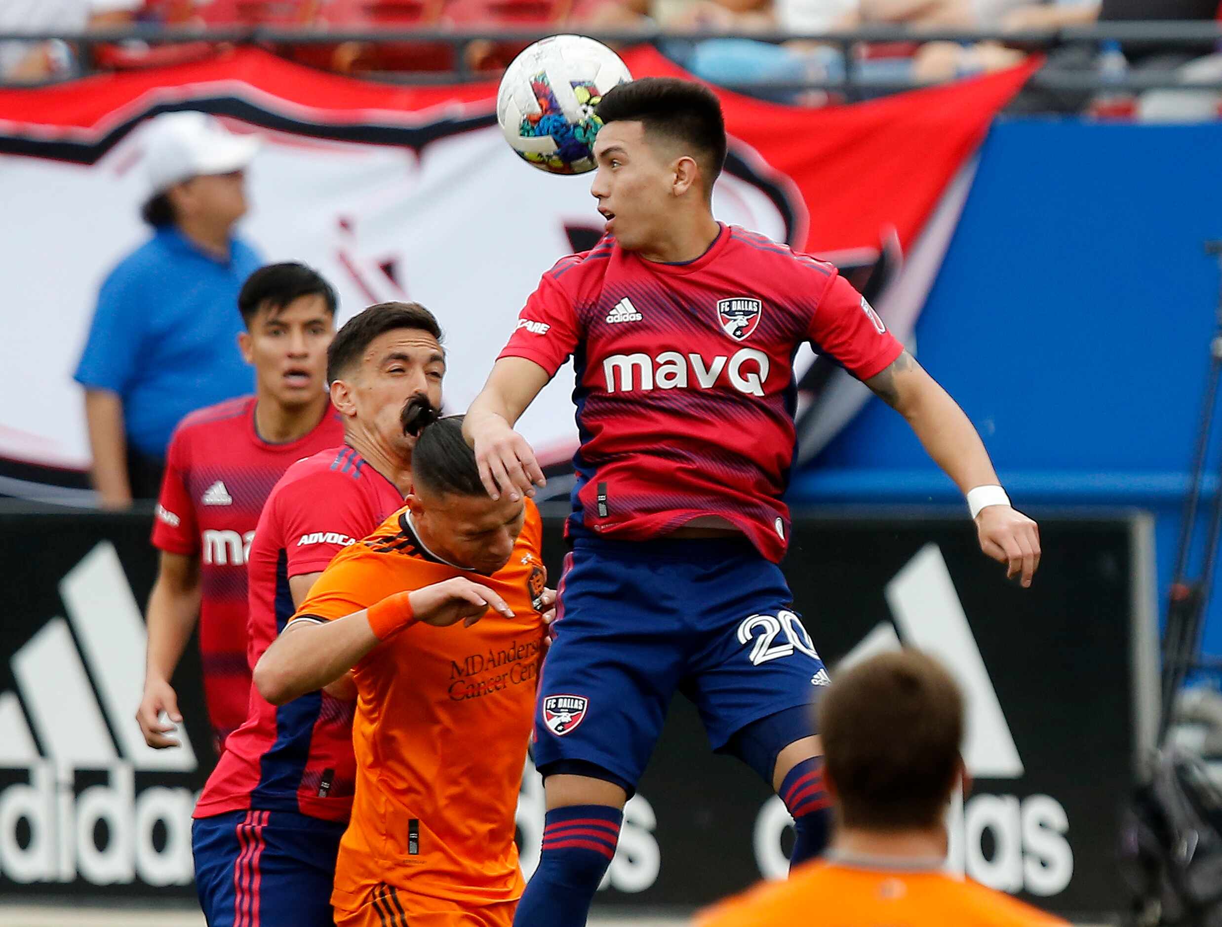 FC Dallas forward Alan Velasco (20) gets a header during the first half as FC Dallas hosted...