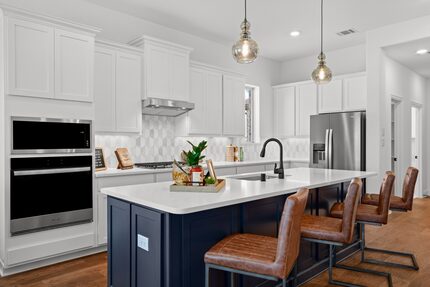 Upgraded white kitchen in an energy efficient home from Beazer Homes