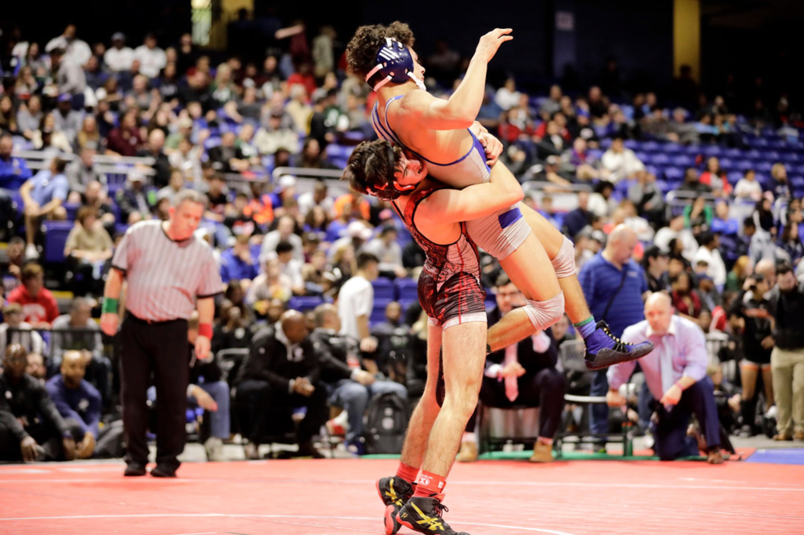 Dominic Chavez of Arlington Martin wrestles during the UIL Texas State Wrestling...