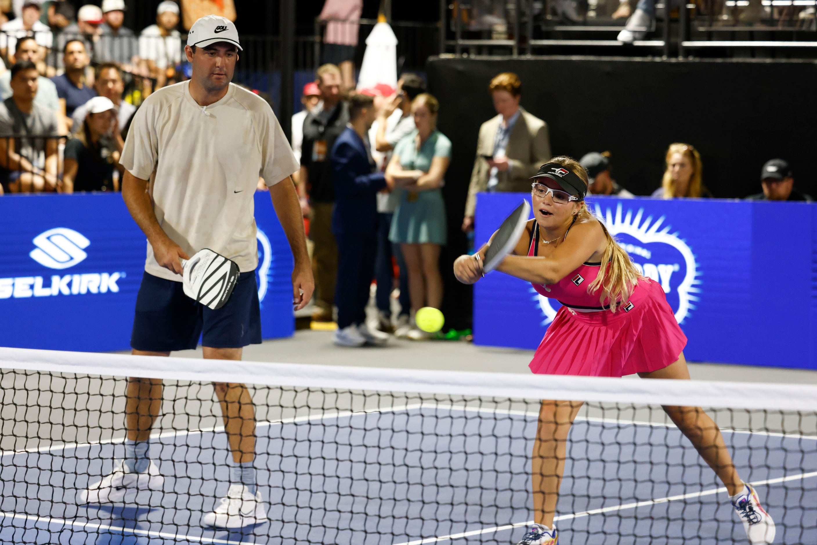 Pro golfer Scottie Scheffler (left) watches as Pickleball Pro World number 1 player, Anna...