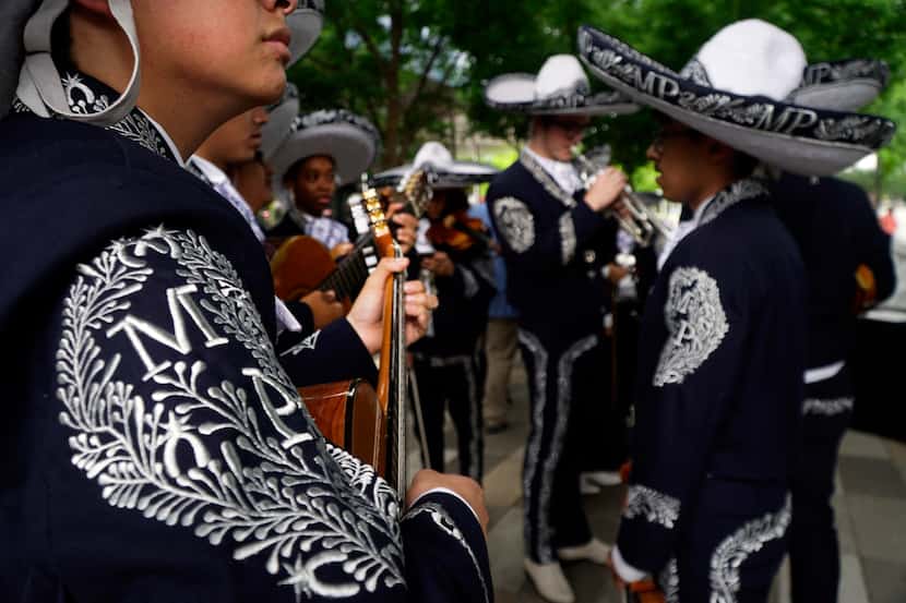 Mariachi Pegazo from Booker T. Washington High School warms up before their performance at...