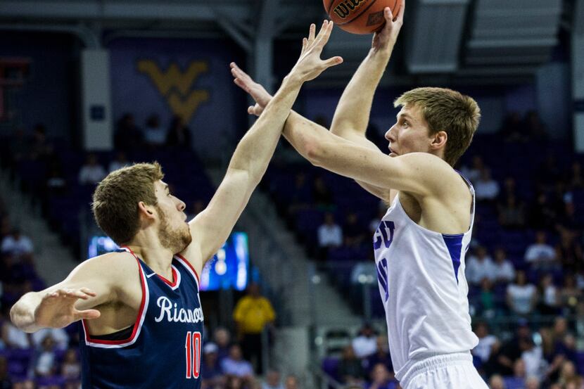 TCU Horned Frogs forward Vladimir Brodziansky (10) goes up for a shot over Richmond Spiders...