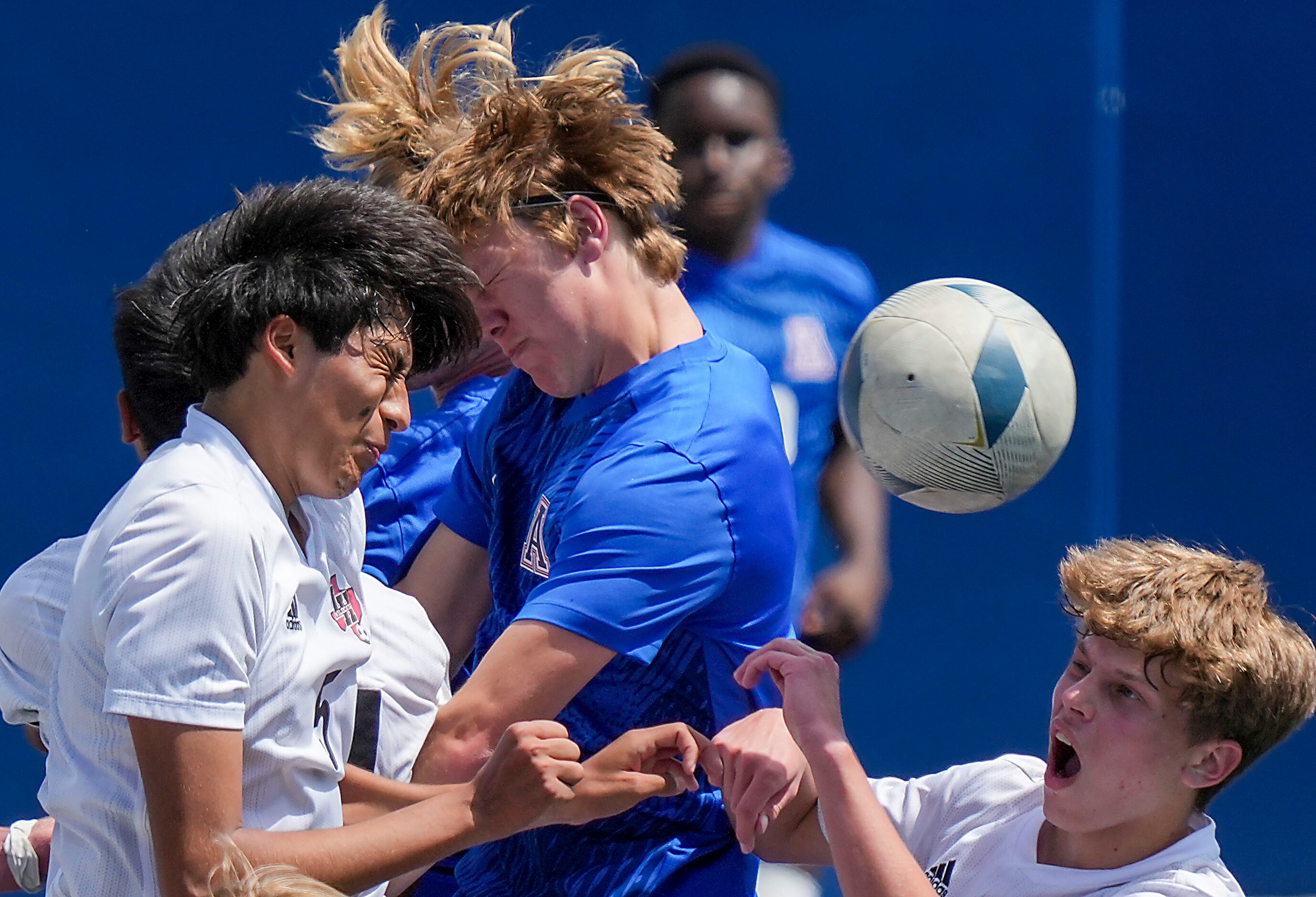 Lake Highlands defender Anthony Licea (5) and midfielder Maddox Morris (right) fight for a...