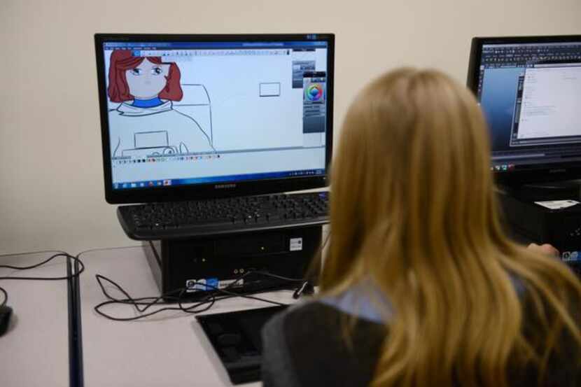 
Senior Rachael Rhynes does graphic artwork during a computer science class at Sachse High...