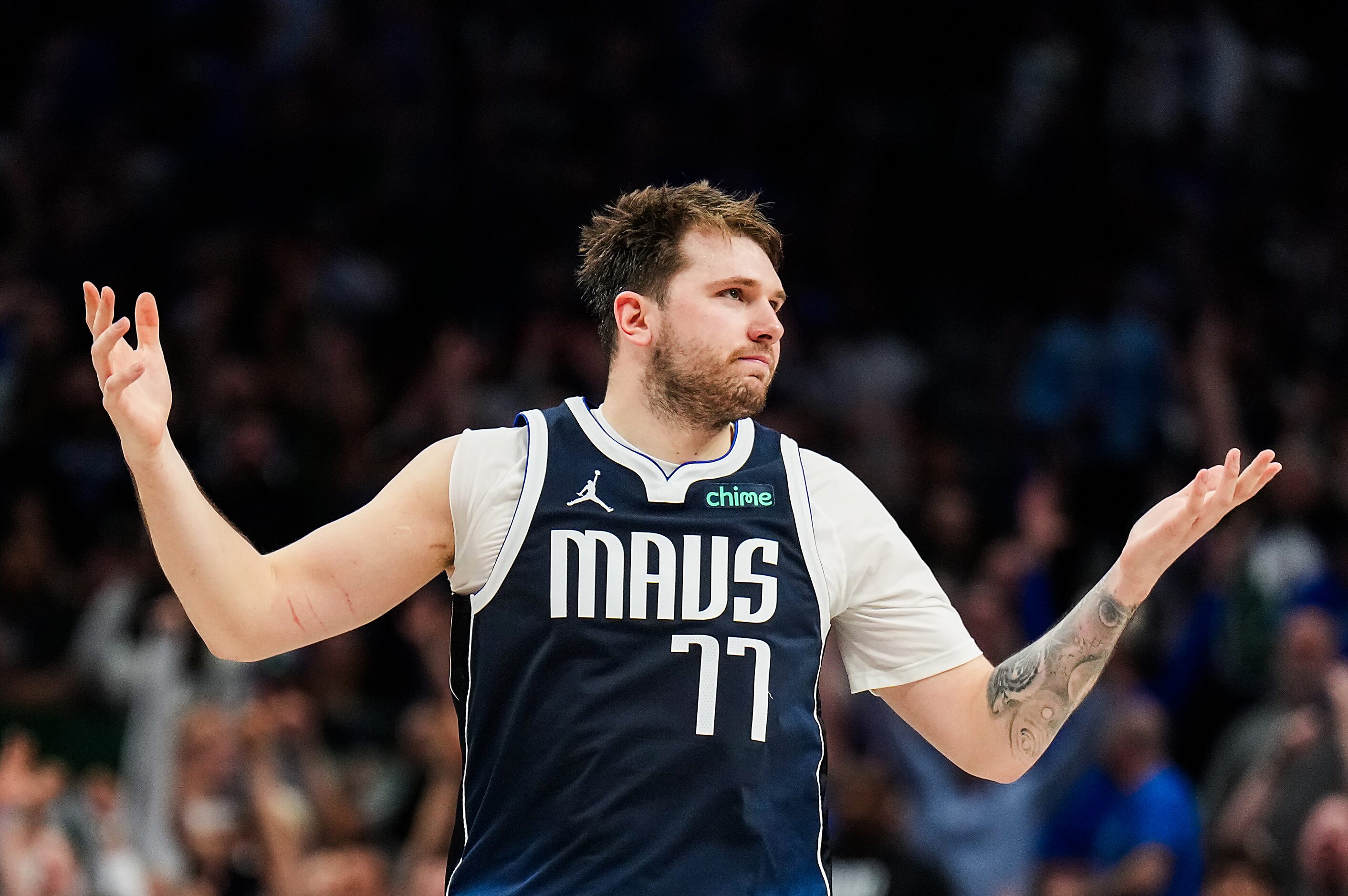 Dallas Mavericks guard Luka Doncic (77) reacts after a basket during the second half of Game...