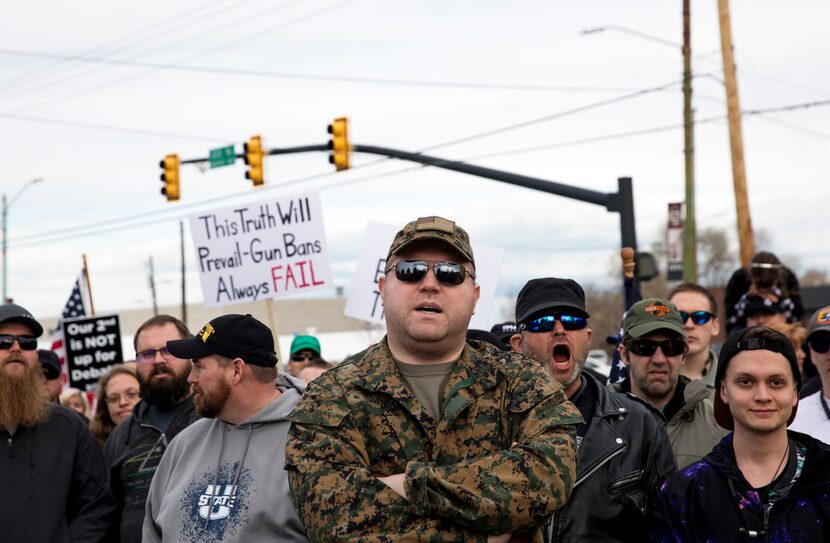 Gun rights supporters take part in a counterprotest before the March for Our Lives rally in...