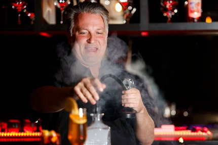 TABC owner Eddie "Lucky" Campbell is in his element behind the bar. Here, he prepares a...