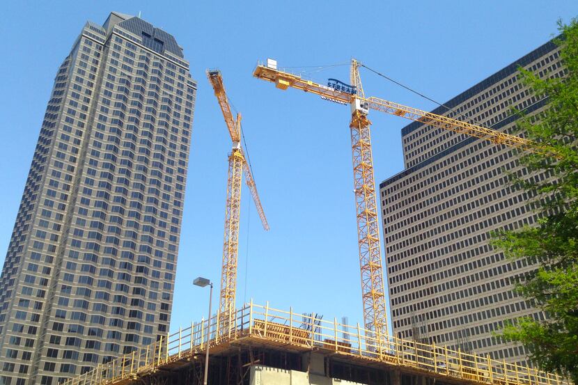 Big job and population gains in Dallas-Fort Worth are keeping the cranes flying on the skyline.