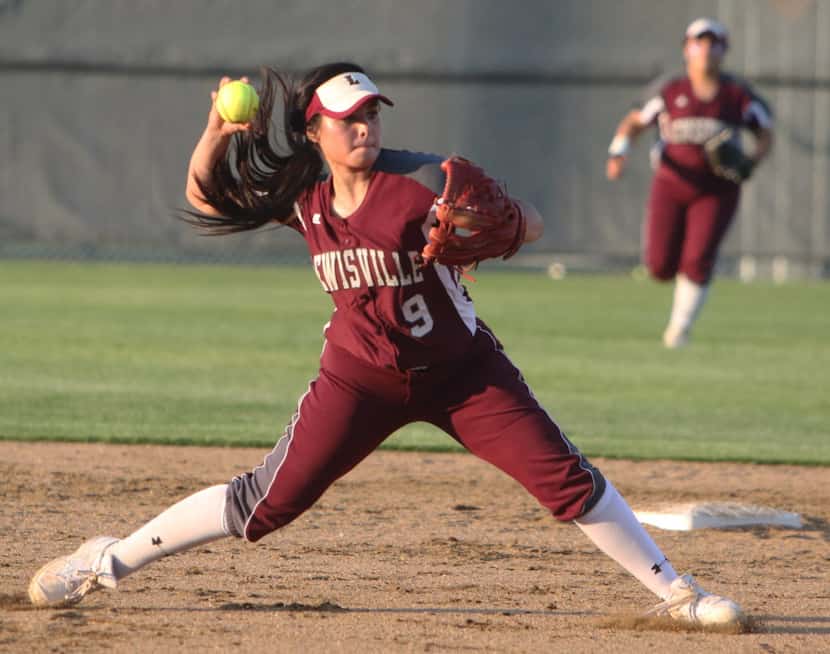 Lewisville's Kaylil Rodriguez throws to home during the 1st  inning of the Class 6A...