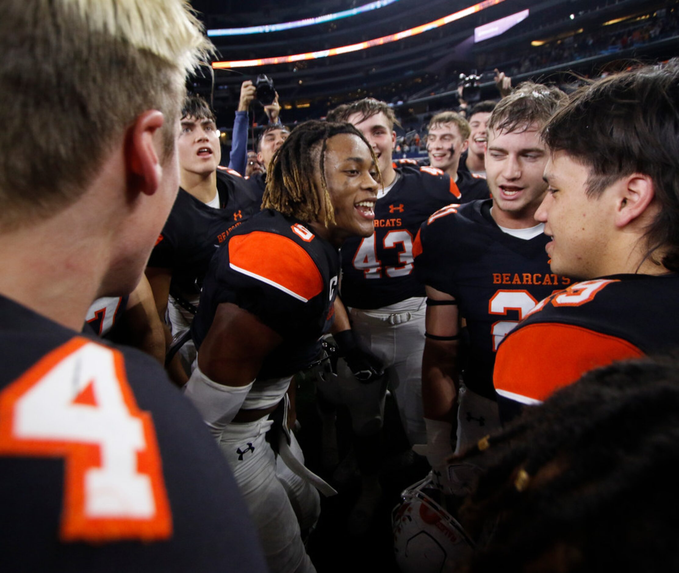 Aledo senior running back Jase McClellan (9) found himself in the center of the Bearcats...