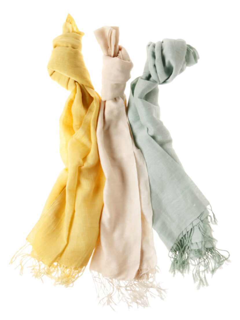 Wrap it: Cotton, linen and silk scarves in aqua, hot pink, turquoise and natural hues are...