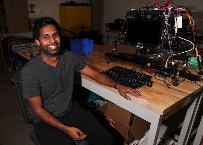 Lakitha Wijeratne, 33, poses for a portrait next to a drone, Tuesday, July 5, 2022 at...