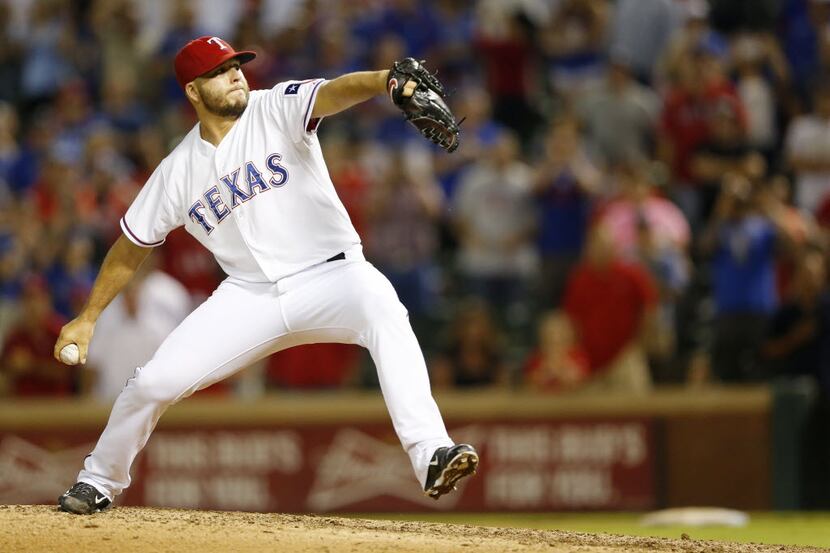 Texas Rangers relief pitcher Shawn Tolleson (37) pitches in a game against the Detroit...