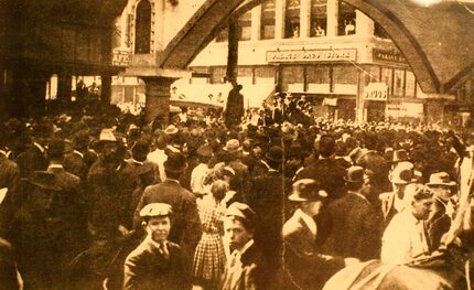 In this March 3, 1910, photo, a mob of 10,000, many of them children, stand shoulder to...