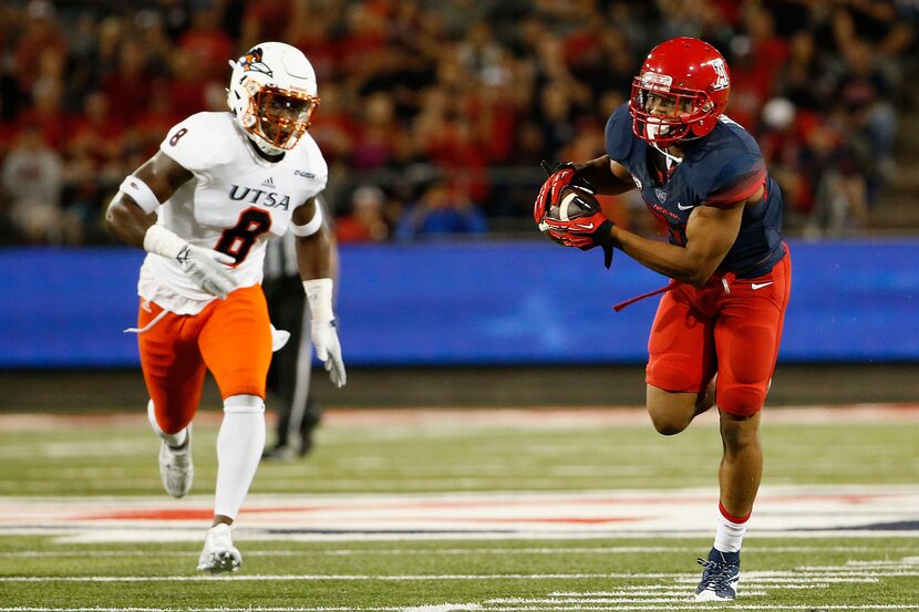 TUCSON, AZ - SEPTEMBER 03:  Wide receiver Johnny Jackson #30 of the Arizona Wildcats catches...