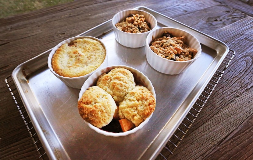 Pastry chef Kristen Massad's desserts include (clockwise from bottom) a cobbler, a buckle, a...