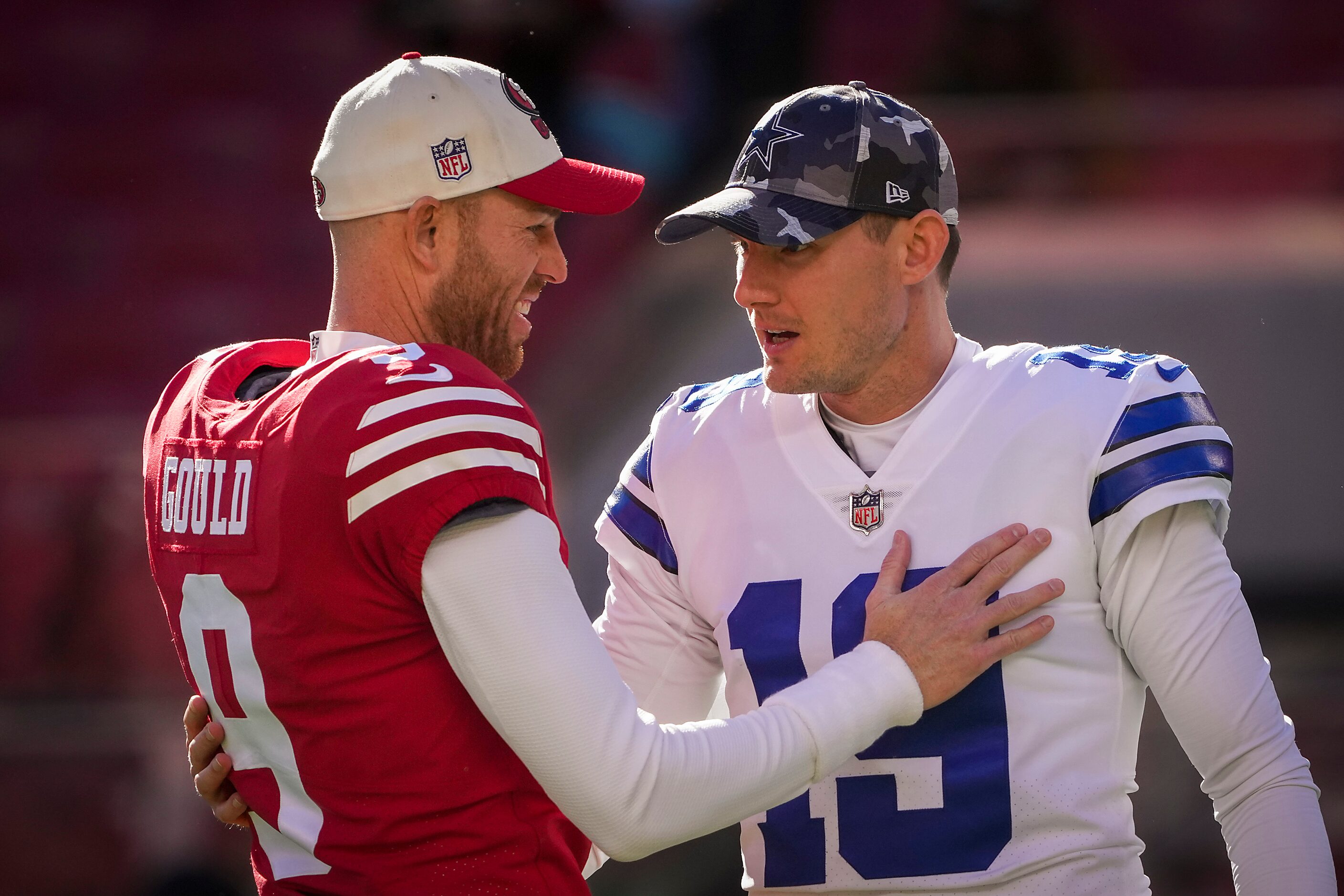 Dallas Cowboys place kicker Brett Maher (19) talks with San Francisco 49ers place kicker...