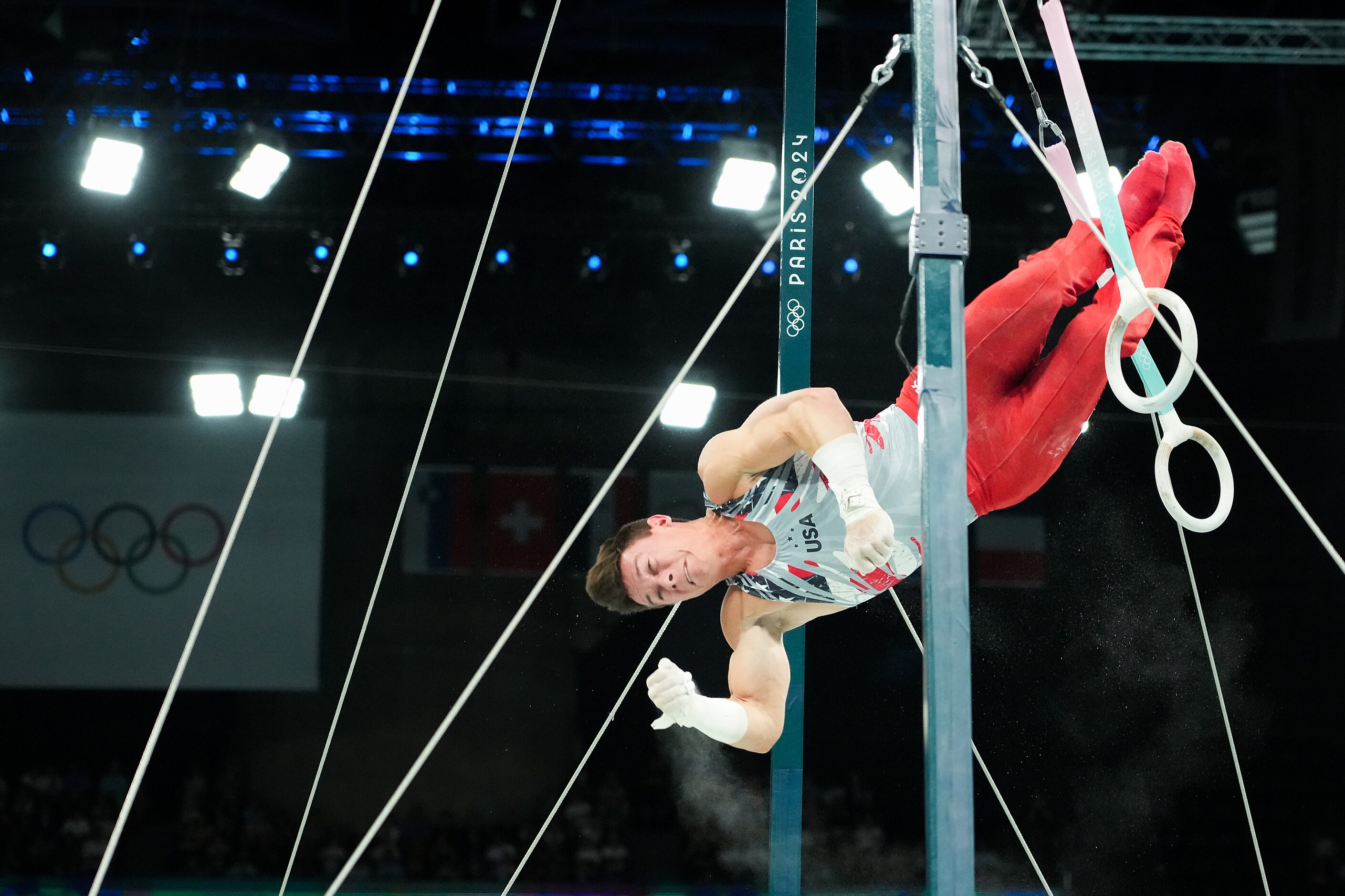 Brody Malone of the United States competes on the rings during the men’s gymnastics team...