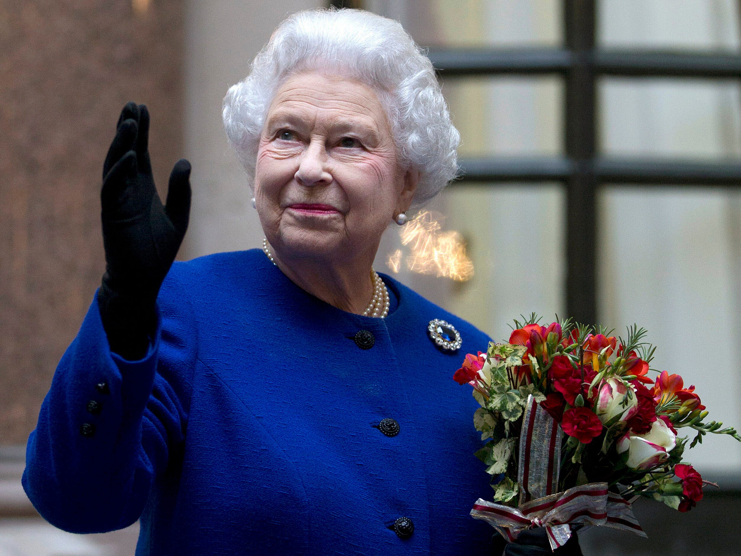 FILE - In this Tuesday, Dec. 18, 2012 file photo, Britain's Queen Elizabeth II looks up and...