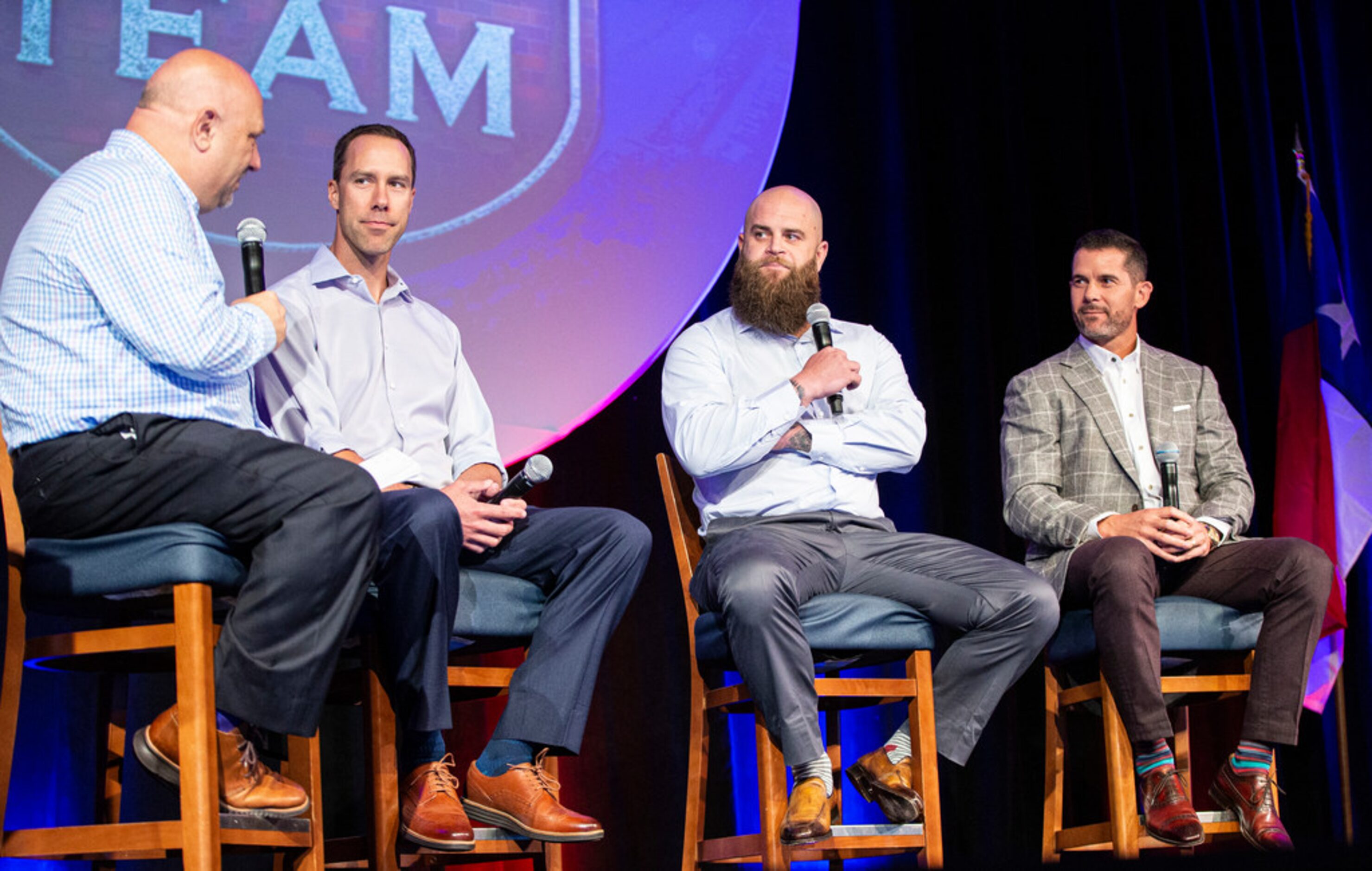 Texas Rangers beat writer Evan Grant, left, asks former players David Murphy, second from...