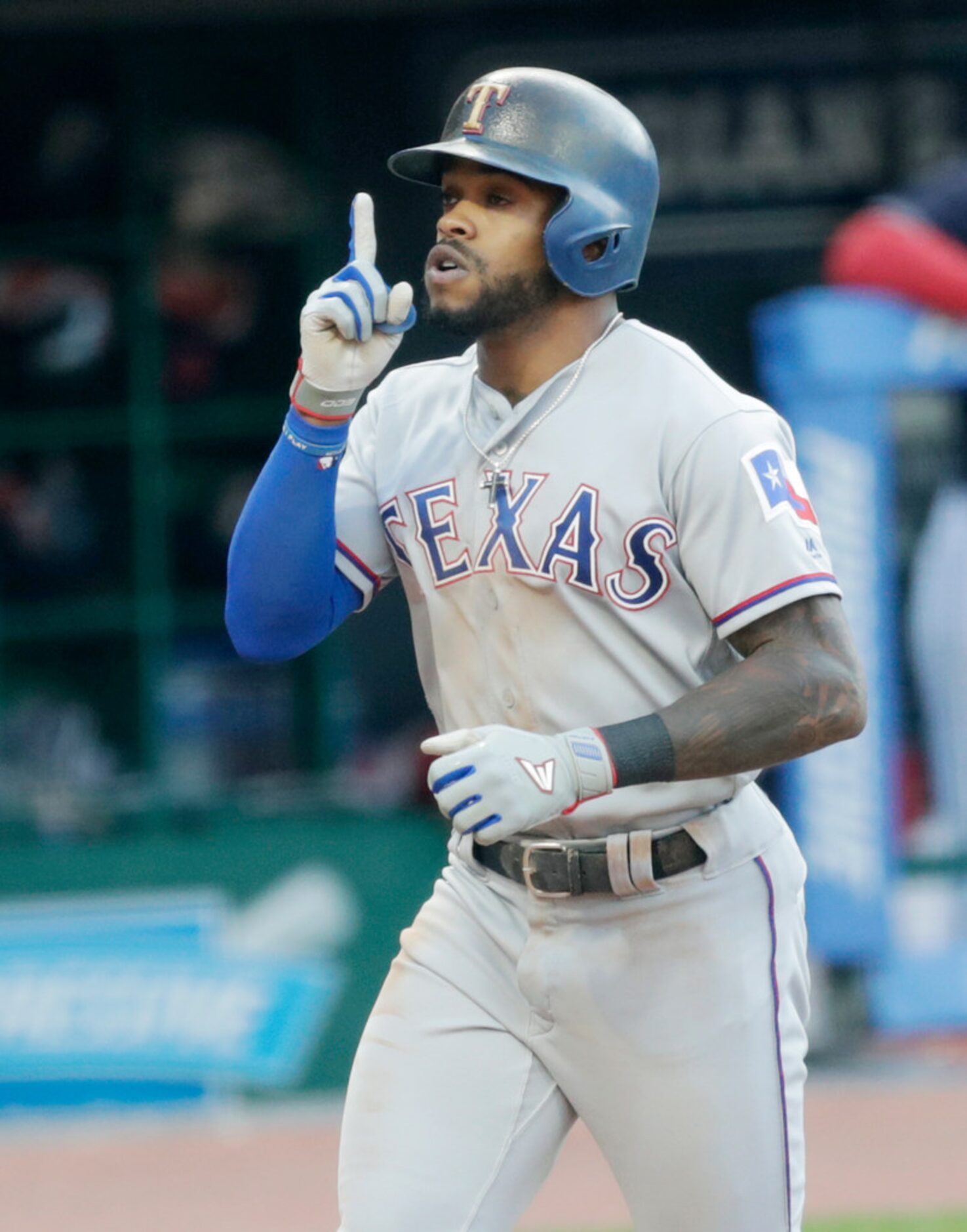 Texas Rangers' Delino DeShields runs the bases after hitting a solo home run off Cleveland...