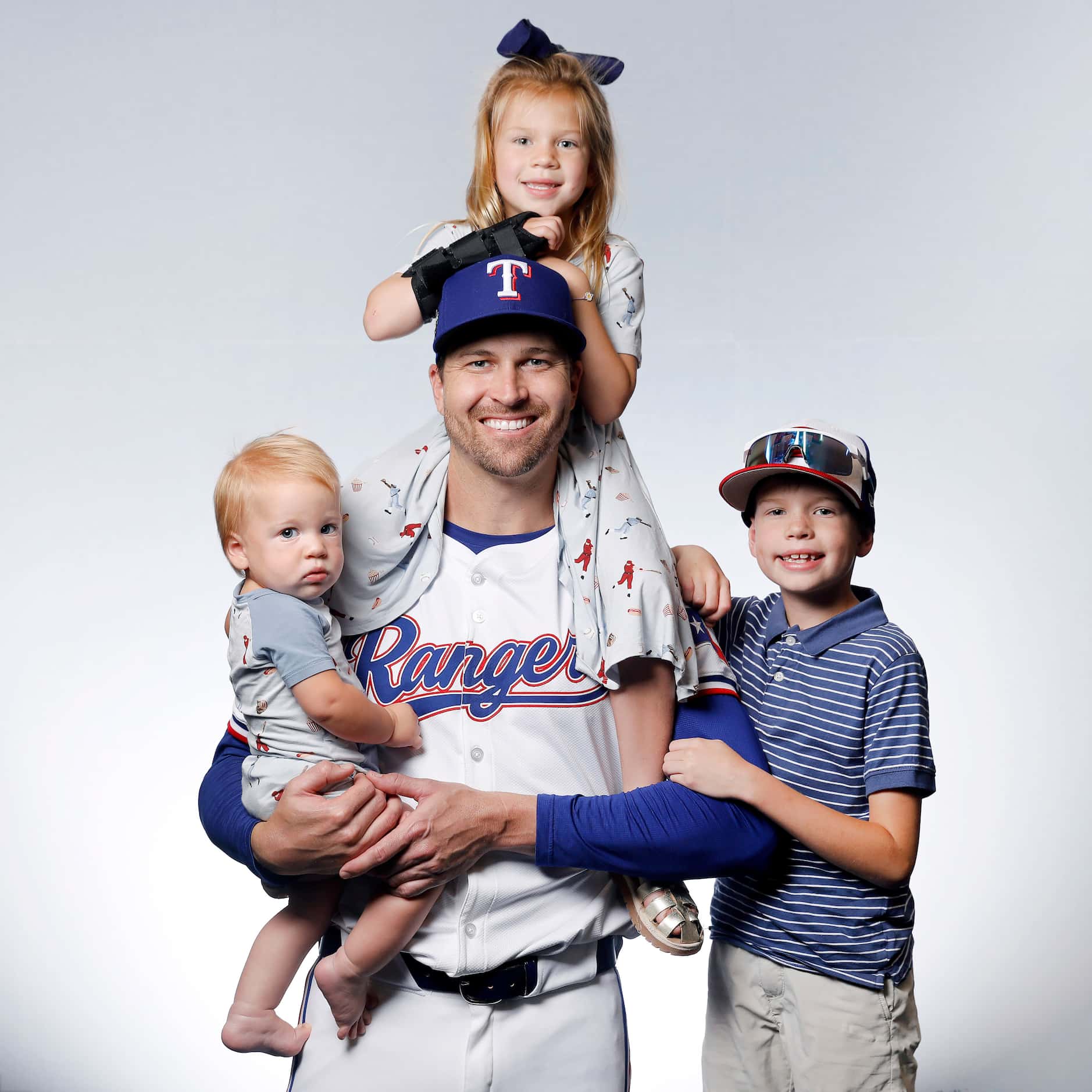 Texas Rangers Jacob deGrom his children (from left) Nolan, Aniston and Jaxon at Globe Life...