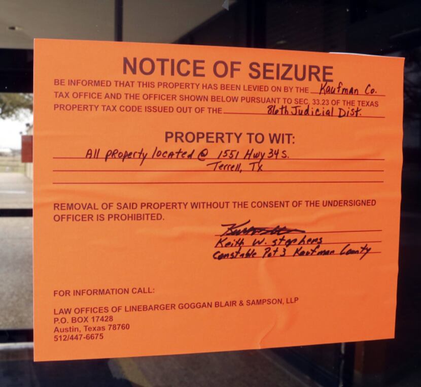 Kaufman County officials posted "Notice of seizure" signs at Renaissance Hospital after the...
