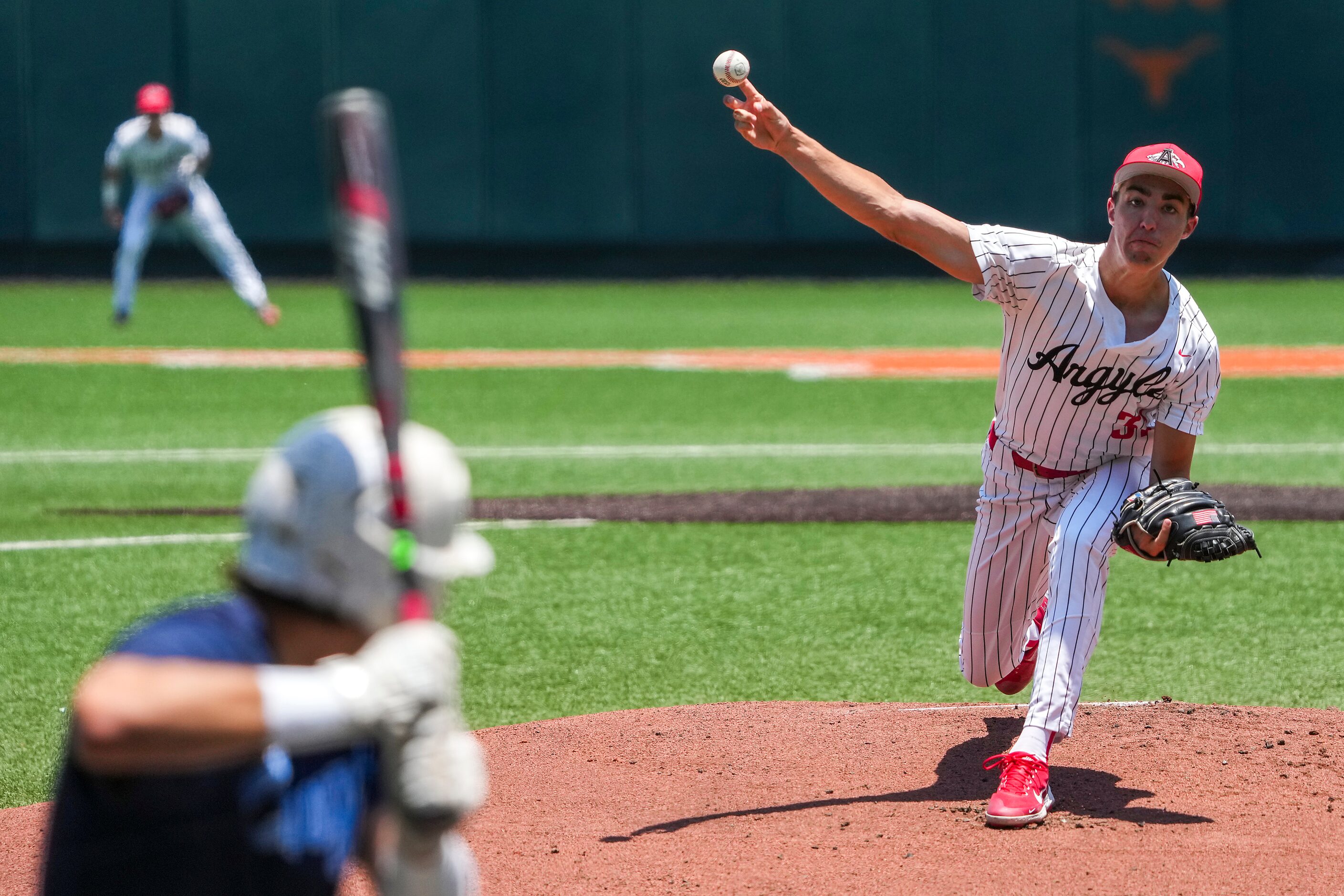 Argyle pitcher Evan Brandt (31) delivers during the first inning of a UIL 4A baseball state...