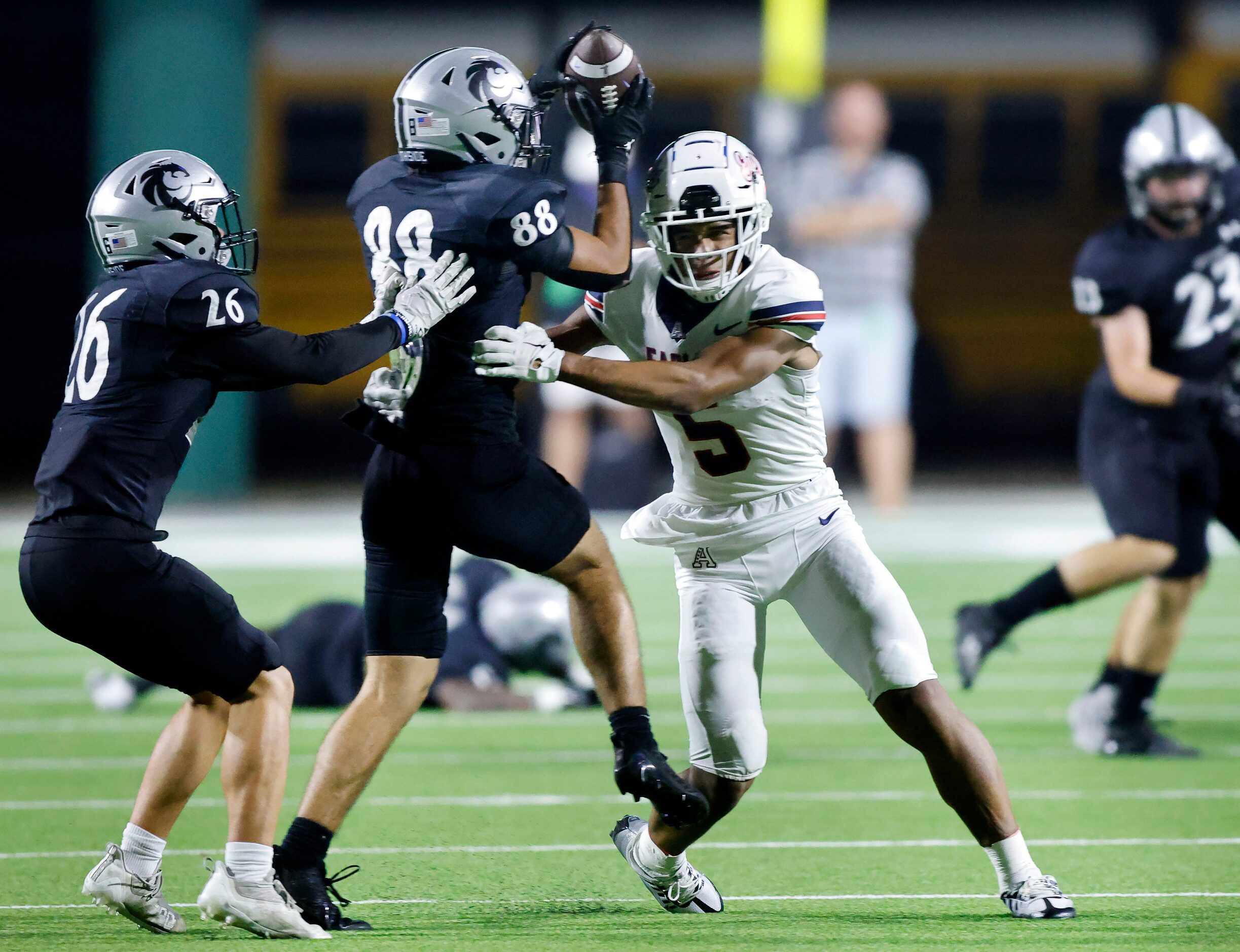 Denton Guyer defensive back Josh Lumsden (88)  intercepts a fourth quarter pass intended for...