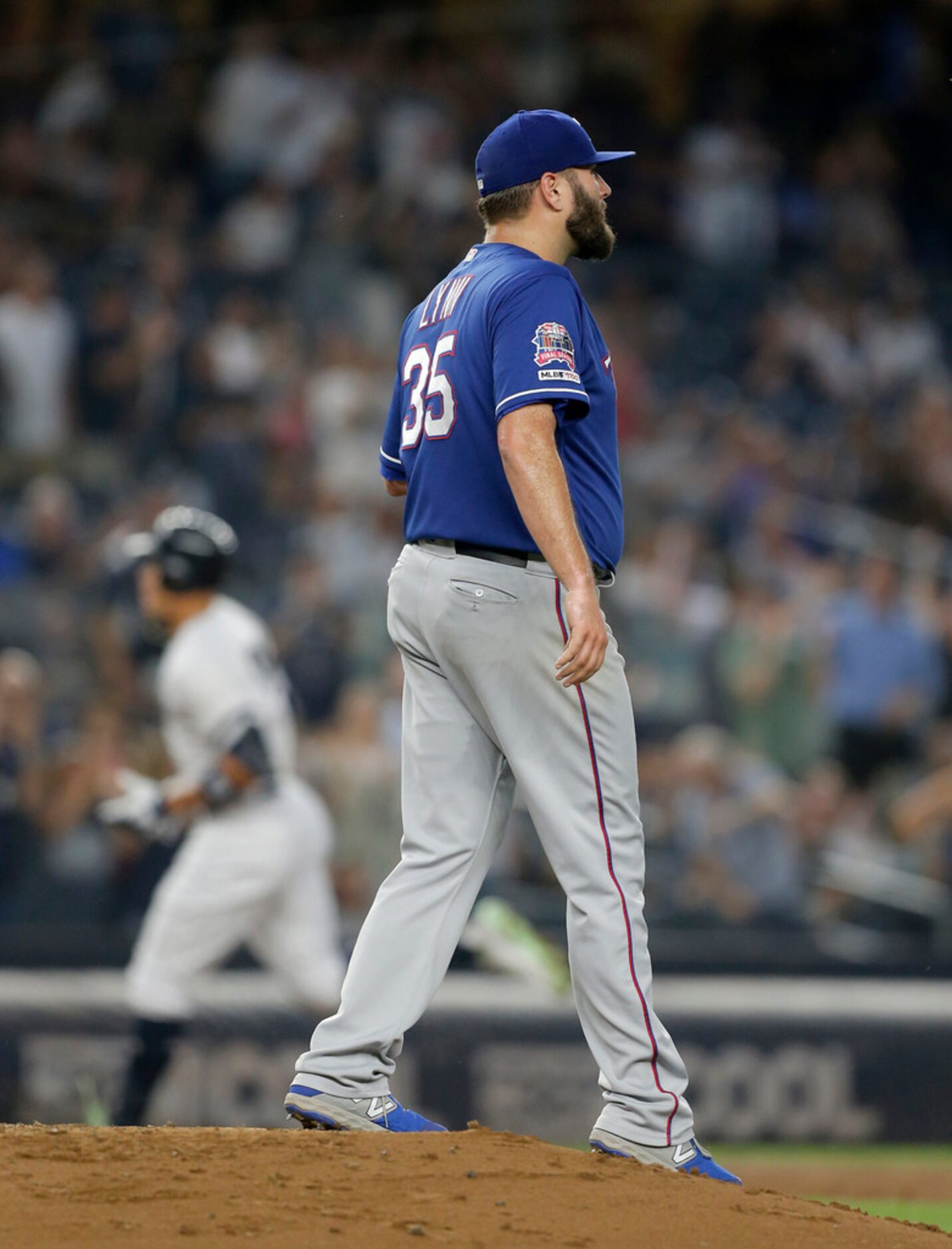 NEW YORK, NEW YORK - SEPTEMBER 04:   Lance Lynn #35 of the Texas Rangers looks on after...