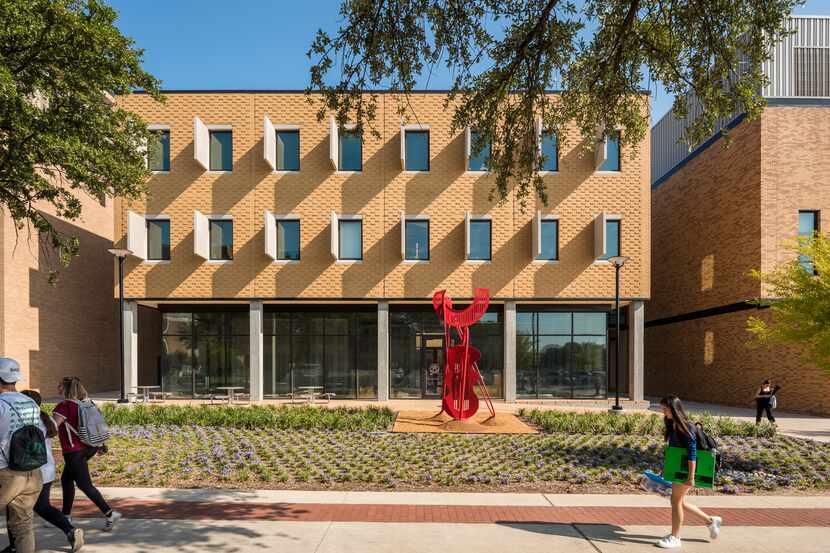 Concrete screening panels animate the façade of the UNT College of Visual Art & Design by...