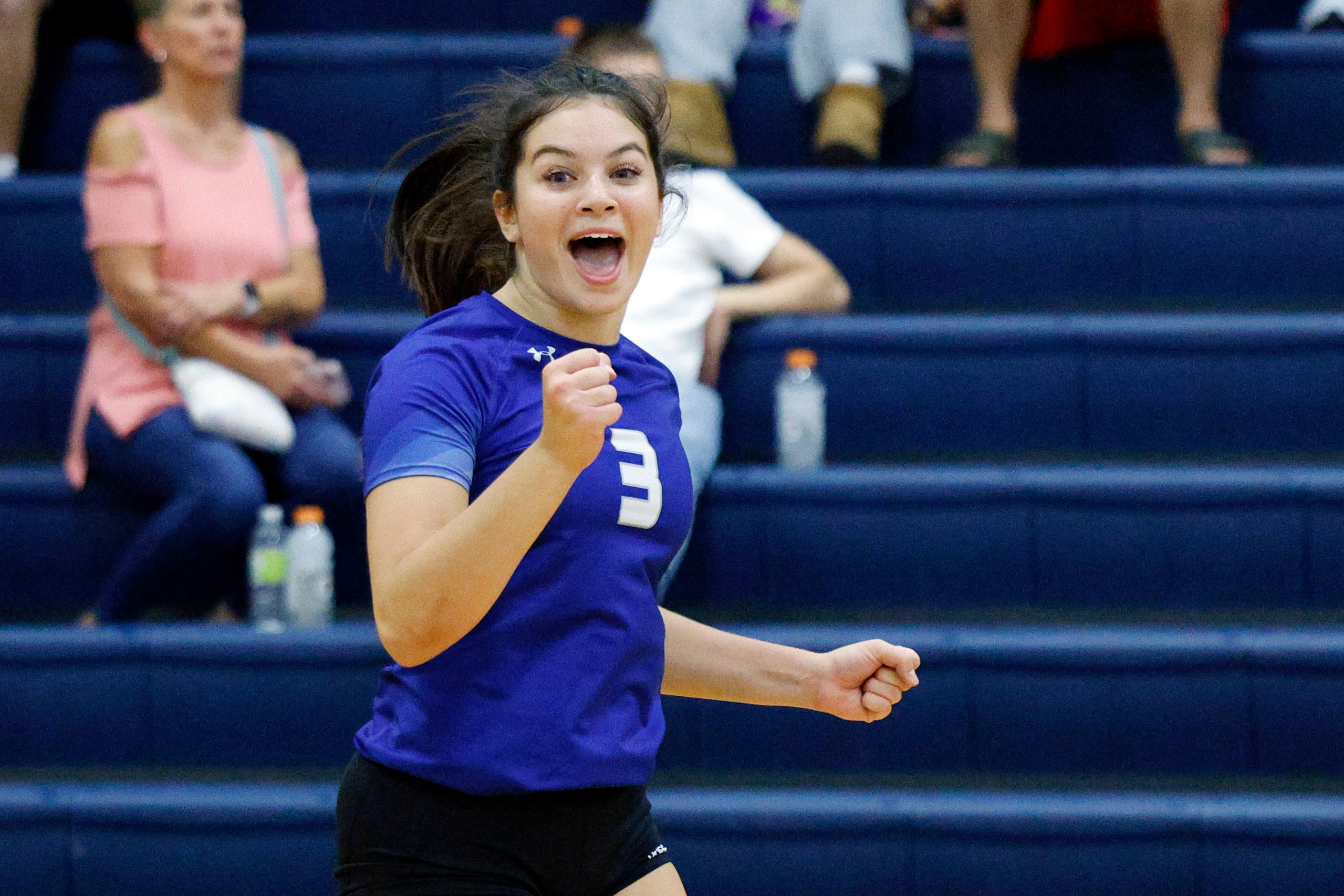 Trophy Club Byron Nelson's Emily Housknecht (3) reacts after a point during a volleyball...