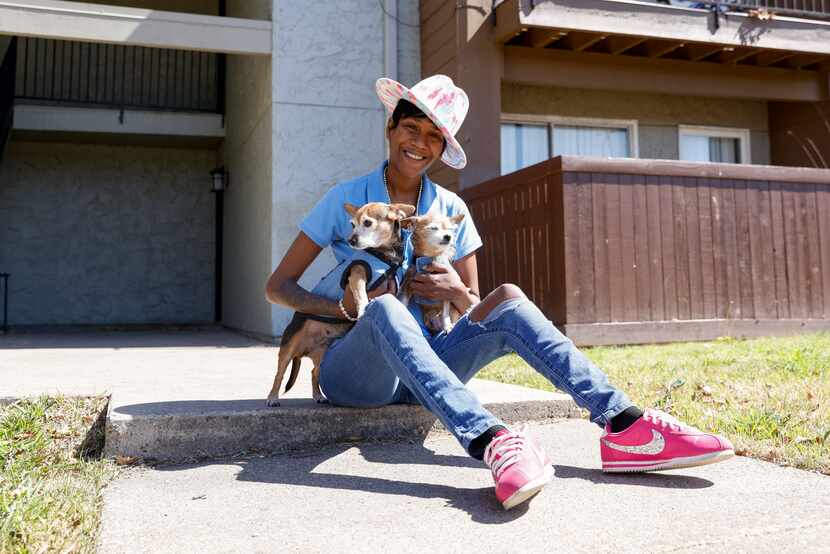 Hillcrest Apartments resident Brittany Jones pictured outside her apartment with her dogs...