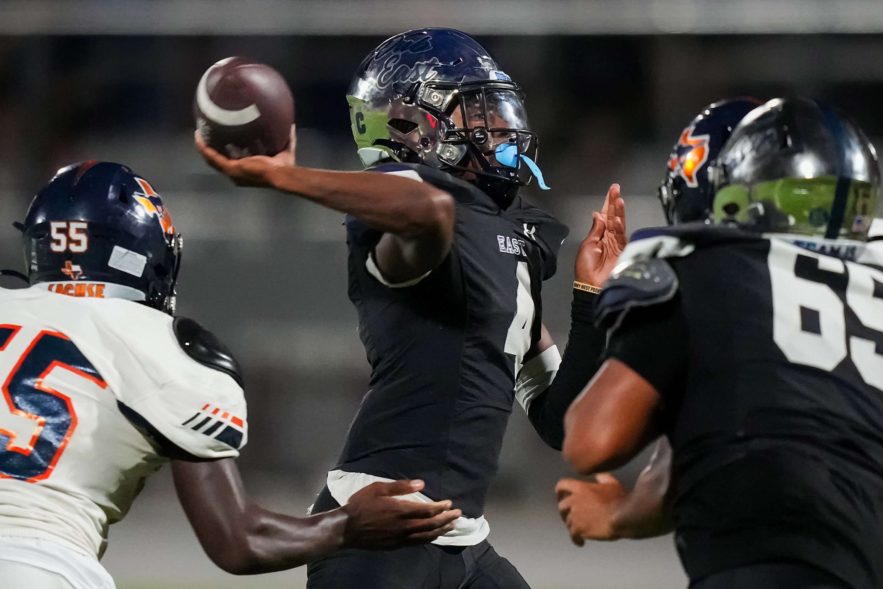 Wylie East quarterback Howard Fisher IV (4) throws a pass during the second half of a...