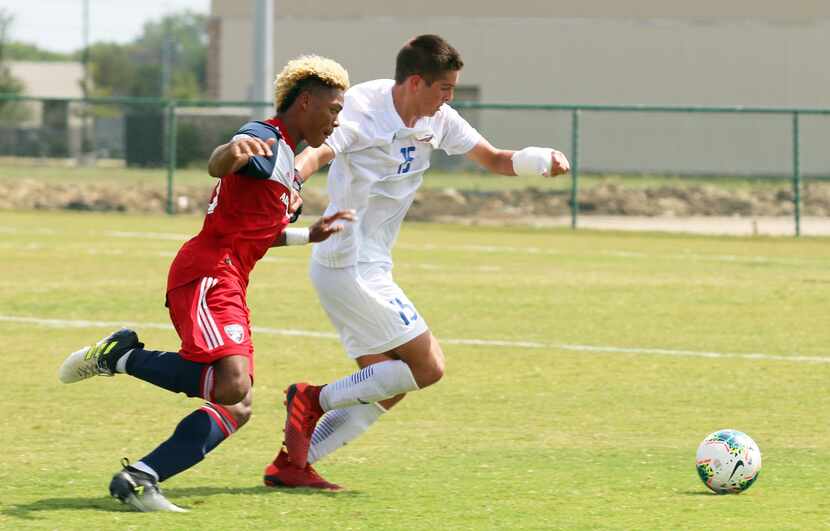 Conner Lewis (#15 white) of Solar SC defends against Malik Henry-Scott of FC Dallas. (9-22-19)