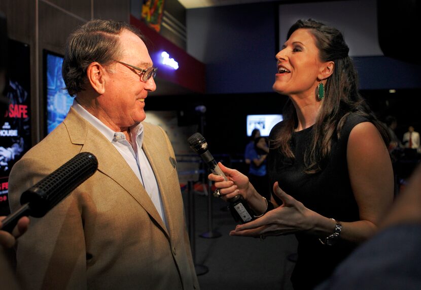 Chuck Howley, left, a member of the Dallas Cowboys first championship team, jokes with...