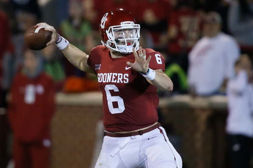 FILE - In this Nov. 11, 2017, file photo, Oklahoma quarterback Baker Mayfield (6) throws in...