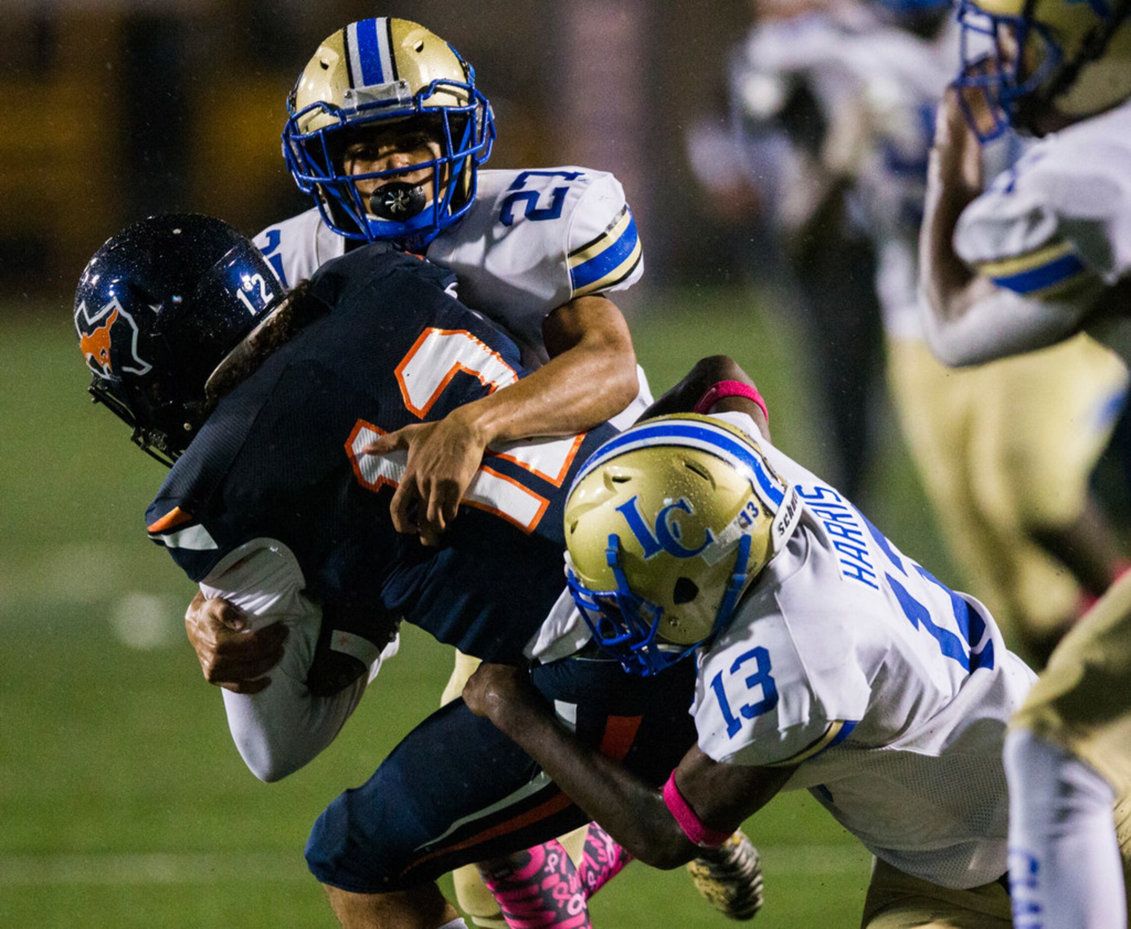 Sachse quarterback Xavier Forman (12) is tackled by Garland Lakeview linebacker Gavin Harris...