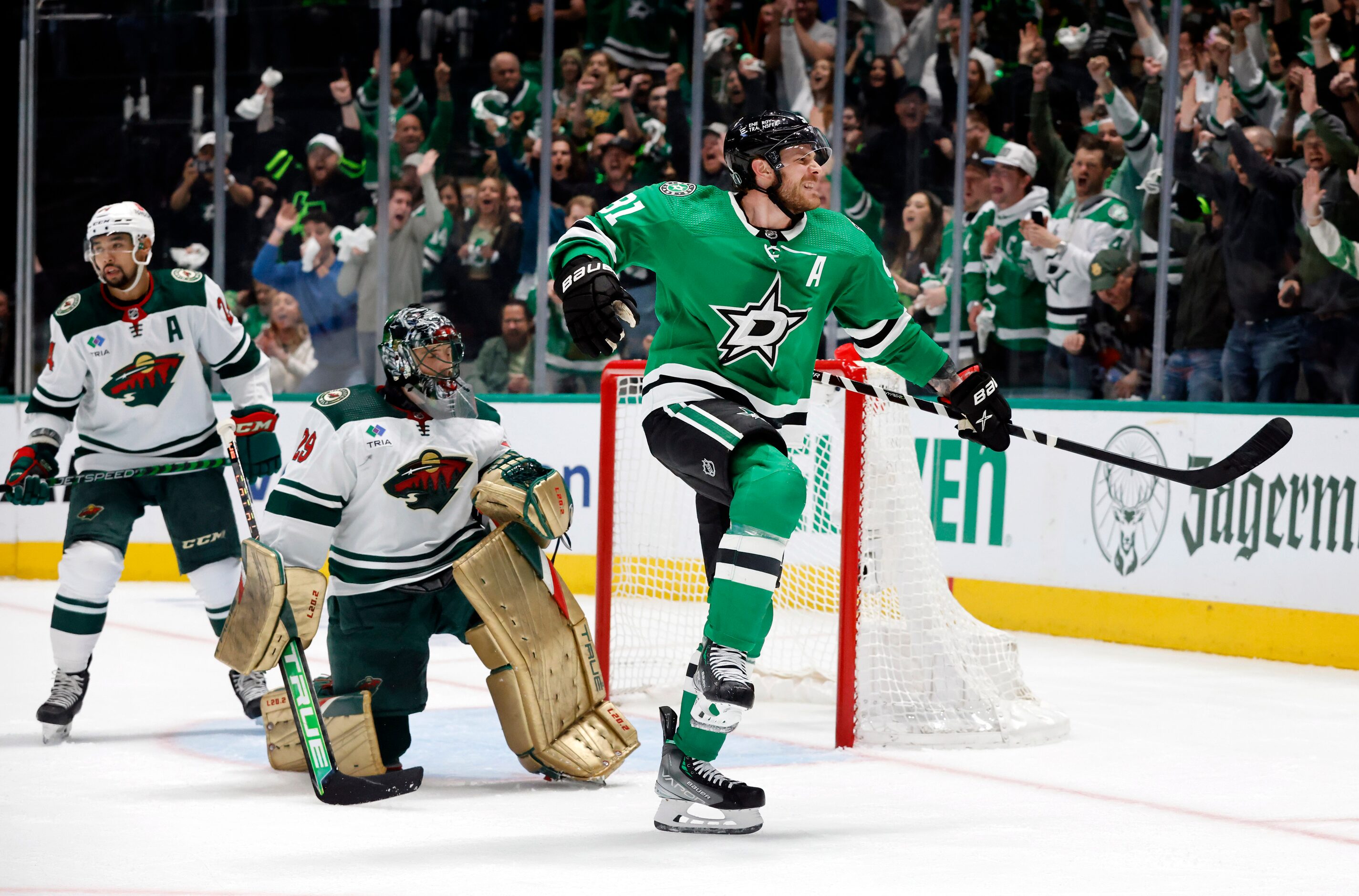 Dallas Stars center Tyler Seguin (91) reacts after scoring on Minnesota Wild goaltender...