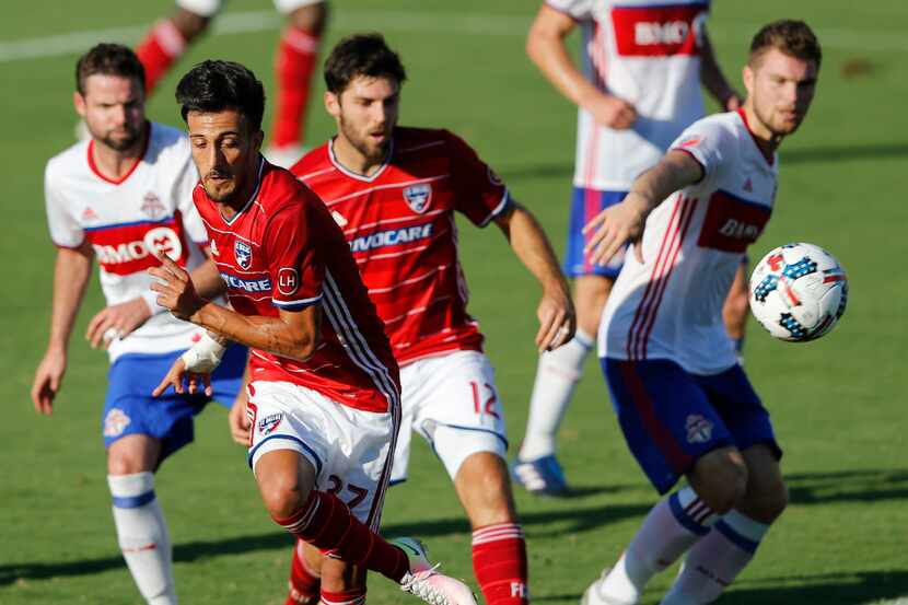 FC Dallas forward Maximiliano Urruti (37) takes a shot on goal during the first half of an...