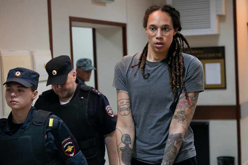 FILE - WNBA star and two-time Olympic gold medalist Brittney Griner is escorted from a...