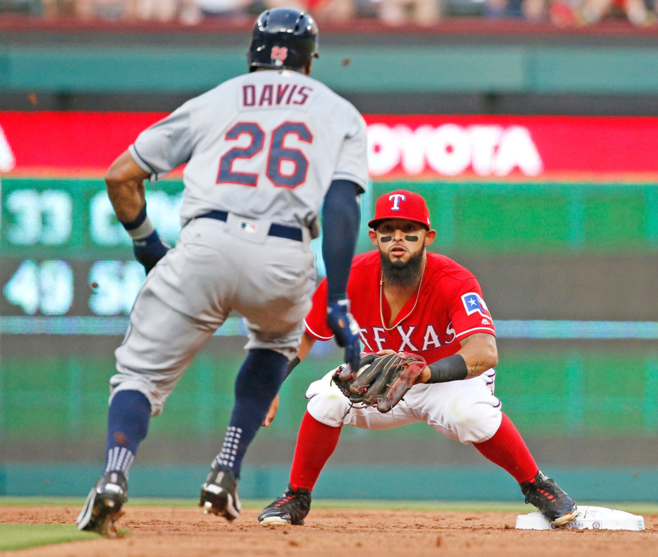 Texas Rangers second baseman Rougned Odor (12) waits to tag Cleveland Indians center fielder...