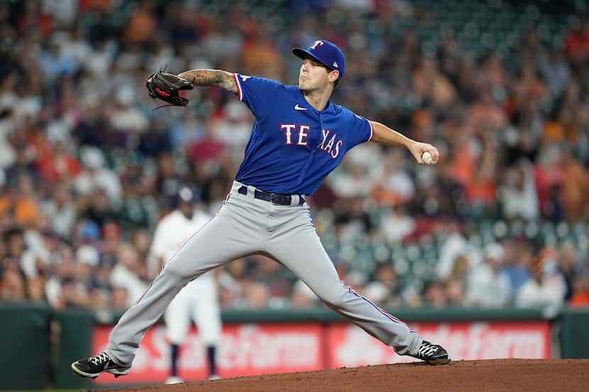 Texas Rangers starting pitcher Cole Ragans throws against the Houston Astros during the...