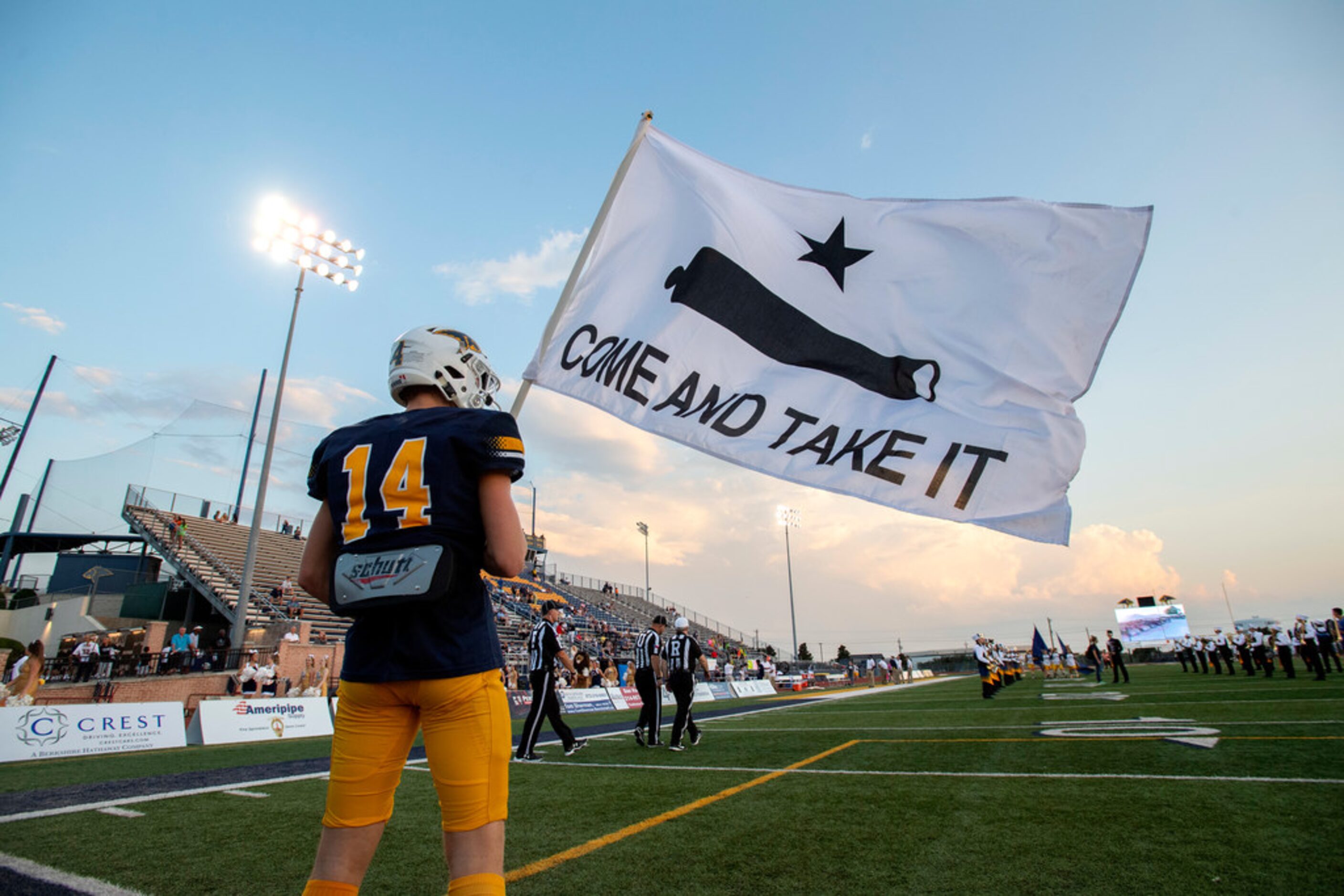 Plano Prestonwood Christian senior wide receiver Dayton Toney waves a "Come And Take It"...