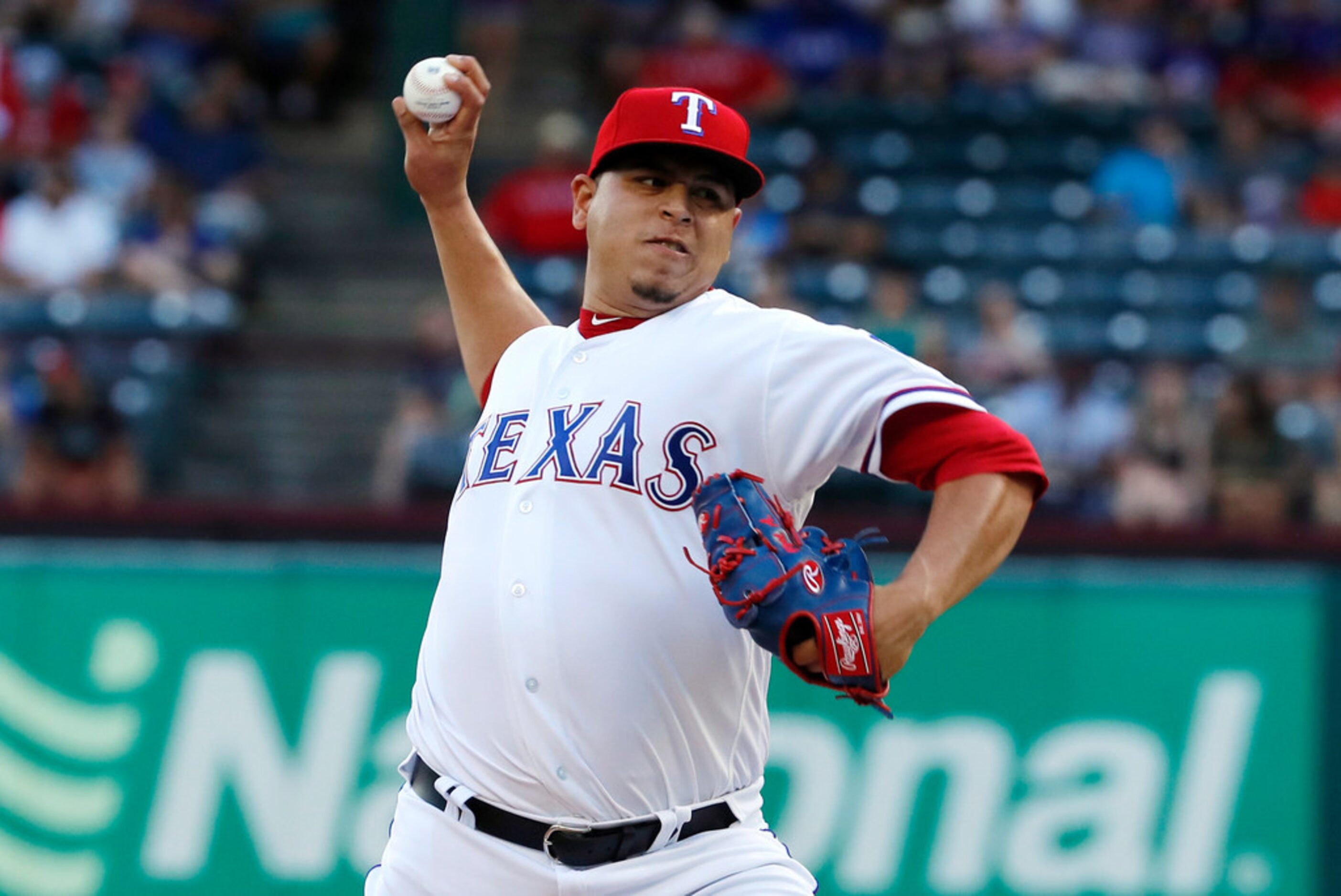 Texas Rangers pitcher Ariel Jurado throws to a Baltimore Orioles batter during the first...