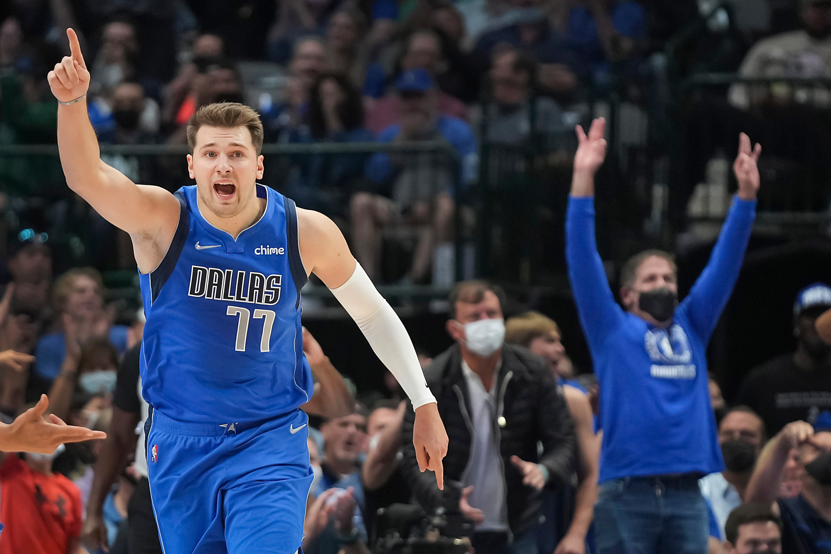 Dallas Mavericks guard Luka Doncic (77) celebrates a Mavericks basket during the first half...