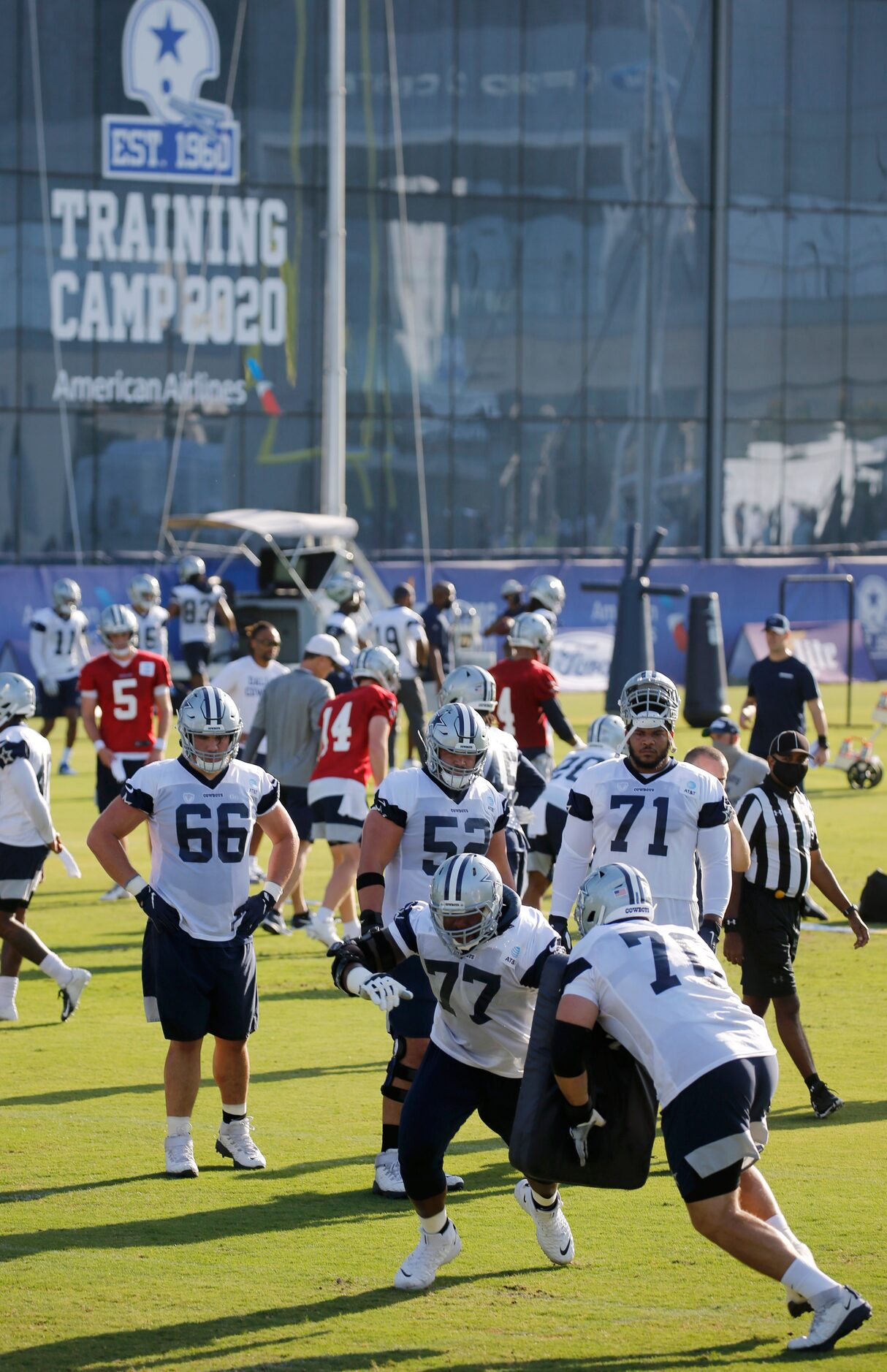 Dallas Cowboys offensive tackle Tyron Smith (77) and Dallas Cowboys guard Zack Martin (70)...