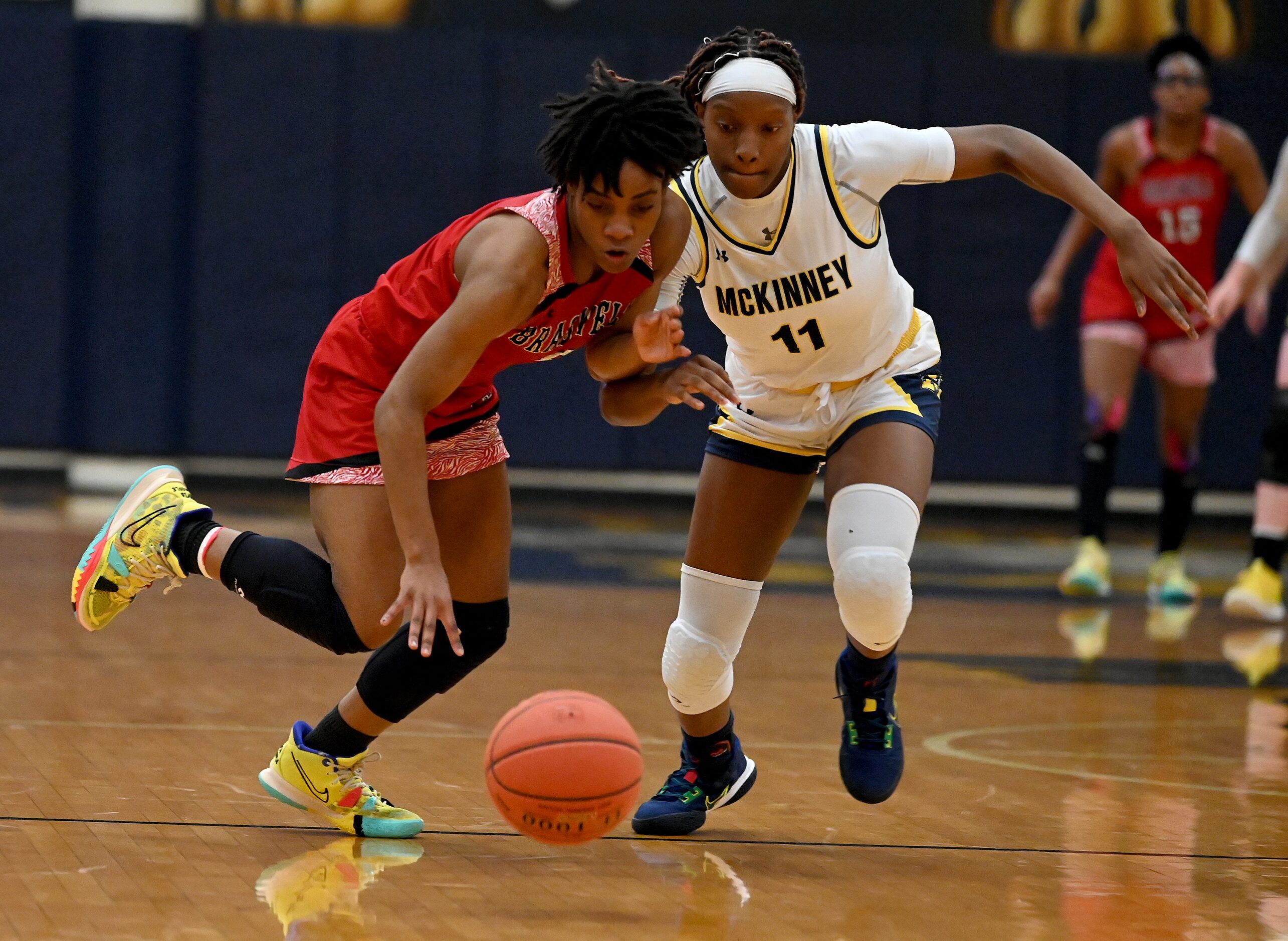 Braswell’s Danae Crosby (5) steals the ball from McKinney’s Adaugo Okpala (11) in the second...