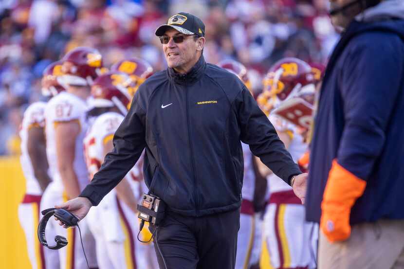 Washington Football Team head coach Ron Rivera reacts to a Dallas Cowboys touchdown during...