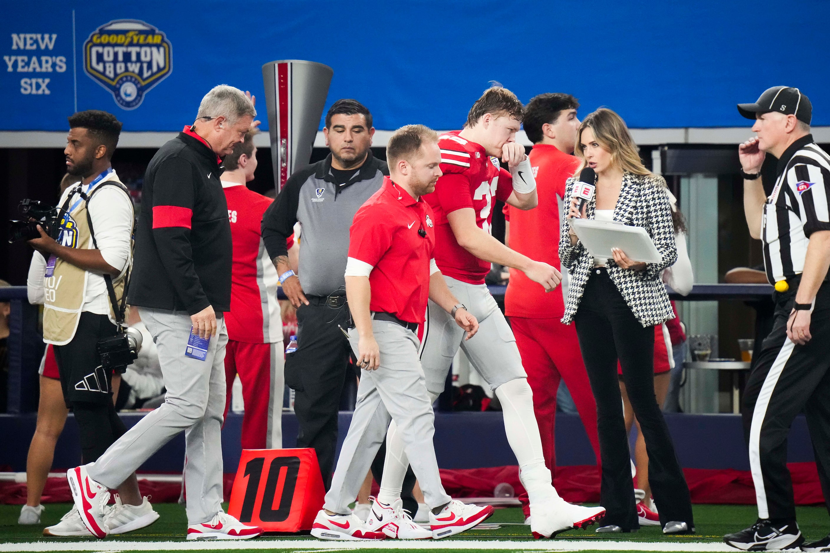 Ohio State quarterback Devin Brown leaves the field after being injured during the first...